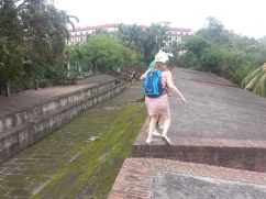 Heather - Mid-Air Jump as we walk along the walls of Intramuros